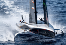 October 04, 2024. Louis Vuitton Cup Final, Race Day 7. INEOS BRITANNIA, David Carr aka “Freddy” celebrates as they cross the line as winners of the Louis Vuitton Cup.